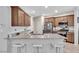 Bright kitchen with stainless steel appliances, granite countertops, ample cabinet space, and a convenient breakfast bar at 9208 S Park St, Las Vegas, NV 89178