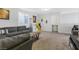 Open living space features cozy seating, gaming and kid-friendly zones, for Gathering-friendly fun at 9208 S Park St, Las Vegas, NV 89178