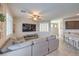 Open-concept living space with neutral colors, stylish decor, and plenty of natural light at 9208 S Park St, Las Vegas, NV 89178