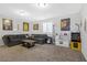 Spacious living room is perfect for entertaining with cozy furniture and charming decorations at 9208 S Park St, Las Vegas, NV 89178