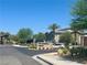 Beautiful community entrance with lush landscaping and stately signage, welcoming residents and guests alike at 965 Nevada State Dr # 39102, Henderson, NV 89002