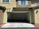Exterior view of a unit with a garage and ample driveway space at 965 Nevada State Dr # 39102, Henderson, NV 89002