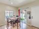 Cozy dining area with a sliding door to the backyard patio at 982 Sable Chase Pl, Henderson, NV 89011