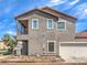 Two-story home with a two-car garage and an exterior side porch at 982 Sable Chase Pl, Henderson, NV 89011