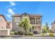 Charming two-story home with desert landscaping and a cozy front porch at 982 Sable Chase Pl, Henderson, NV 89011