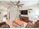 Spacious living room with tile flooring, ceiling fan and media center at 982 Sable Chase Pl, Henderson, NV 89011