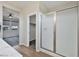 Ensuite bathroom with tile floors, glass shower and door to the main bedroom and closet at 10270 Turkish Pine Ct, Las Vegas, NV 89166