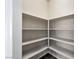 Spacious pantry with multiple shelves for organized storage, making it ideal for kitchen essentials and supplies at 10270 Turkish Pine Ct, Las Vegas, NV 89166