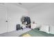 Bedroom with neutral paint and carpet, a closet rack, and decor throughout at 10292 Fragrant Apple Ct, Las Vegas, NV 89141