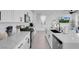 Modern kitchen with sleek countertops, stainless steel appliances, and a stylish black sink at 10292 Fragrant Apple Ct, Las Vegas, NV 89141