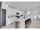 Bright kitchen boasts an island with seating and modern appliances at 10292 Fragrant Apple Ct, Las Vegas, NV 89141
