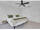 Main bedroom features neutral paint, plush carpet, and a ceiling fan at 10292 Fragrant Apple Ct, Las Vegas, NV 89141