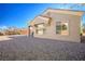 Backyard patio area with low maintenance desert landscaping at 10628 Mission Lakes Ave, Las Vegas, NV 89134