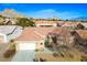 Inviting single-story home with tile roof and mountain views at 10628 Mission Lakes Ave, Las Vegas, NV 89134