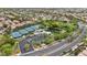 Community park featuring tennis courts, parking, green space, and mature trees at 10952 Napa Ridge Dr, Las Vegas, NV 89144