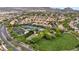 Community park featuring tennis courts, a playground, green space, and mature trees at 10952 Napa Ridge Dr, Las Vegas, NV 89144