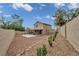 Spacious backyard with a covered patio, providing ample outdoor living space at 10952 Napa Ridge Dr, Las Vegas, NV 89144