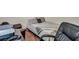 Bedroom setting with a comfy bed, personal workspace, and warm, inviting atmosphere for unwinding at 10952 Napa Ridge Dr, Las Vegas, NV 89144