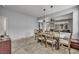 Open concept dining room with updated flooring offers plenty of space for entertaining at 10952 Napa Ridge Dr, Las Vegas, NV 89144