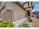 Inviting single-Gathering home with a two-car garage, desert landscaping, and covered entry at 10952 Napa Ridge Dr, Las Vegas, NV 89144