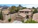 Attractive two-story home with desert landscaping, a two-car garage, and a tile roof at 10952 Napa Ridge Dr, Las Vegas, NV 89144