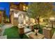 Inviting front porch with decorative pillars and manicured landscaping at 1272 Olivia Pkwy, Henderson, NV 89011