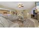 Open-concept living area with fireplace and seamless access to the kitchen at 1272 Olivia Pkwy, Henderson, NV 89011