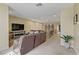 Spacious living room with a cozy seating area and a media center at 1272 Olivia Pkwy, Henderson, NV 89011