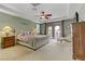 Large main bedroom with ensuite, ceiling fan, private balcony and natural light at 1272 Olivia Pkwy, Henderson, NV 89011