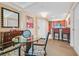 Charming dining area with a glass table and views into the kitchen, perfect for intimate meals at 135 E Harmon Ave # 1401, Las Vegas, NV 89109