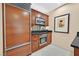 Modern kitchenette features sleek appliances, custom cabinets and ample counter space at 135 E Harmon Ave # 1401, Las Vegas, NV 89109