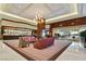 Elegant lobby featuring modern seating, stylish decor, and sophisticated lighting at 135 E Harmon Ave # 1401, Las Vegas, NV 89109