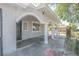 Arched front porch entry offers shade and architectural detail to the exterior of this home at 1413 Culley St, Las Vegas, NV 89110