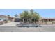 Charming single-story home featuring mature shade trees, brick accents, and a spacious driveway at 1413 Culley St, Las Vegas, NV 89110