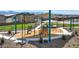 Community playground offering a shady picnic area and state-of-the-art play equipment at 1417 Gable Falls Pl # 91, North Las Vegas, NV 89084