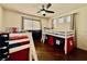 ' bedroom featuring fun bunk beds, ceiling fan, and window at 1704 Cordoba Canyon St, Las Vegas, NV 89117