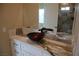 Bathroom vanity featuring vessel sink and chrome faucet at 197 E Shelbourne Ave, Las Vegas, NV 89123