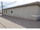 Side view of the house with a gravel landscape at 197 E Shelbourne Ave, Las Vegas, NV 89123