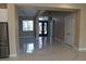 Spacious foyer with elegant marble floors reflecting natural light from the decorative double door at 197 E Shelbourne Ave, Las Vegas, NV 89123