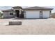Charming single-story home featuring a two-car garage, gated entry and desert landscaping at 197 E Shelbourne Ave, Las Vegas, NV 89123
