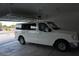 Attached garage with extended van ready for its next road trip at 197 E Shelbourne Ave, Las Vegas, NV 89123
