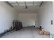Spacious garage interior featuring ample storage space, door to outside, and potential for customization at 197 E Shelbourne Ave, Las Vegas, NV 89123