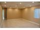 Bright living room featuring recessed lighting and marble flooring at 197 E Shelbourne Ave, Las Vegas, NV 89123