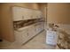 Mud room with white cabinets and marble countertops at 197 E Shelbourne Ave, Las Vegas, NV 89123