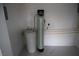Utility room with water softener and ceramic tile flooring at 197 E Shelbourne Ave, Las Vegas, NV 89123