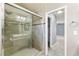 Modern bathroom featuring a glass-enclosed shower with tile surround at 2062 Club Crest Way, Henderson, NV 89014