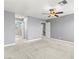 Carpeted bedroom with ceiling fan, ample lighting and ensuite bathroom at 2062 Club Crest Way, Henderson, NV 89014