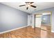 Bedroom with hardwood floors and mirrored closet doors at 2062 Club Crest Way, Henderson, NV 89014