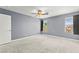 Bedroom featuring neutral walls, carpet, ceiling fan, and natural light at 2062 Club Crest Way, Henderson, NV 89014