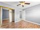 Bedroom featuring hardwood floors and a mirrored closet at 2062 Club Crest Way, Henderson, NV 89014